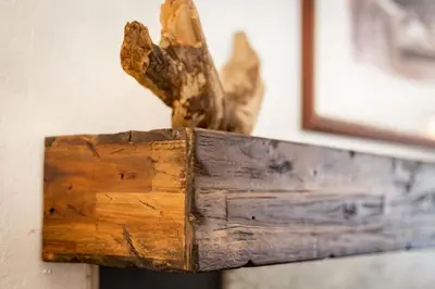 a piece of wood sitting on top of a wooden box at Coziness Cabin - Cute little cabin in the Tahoe woods in South Lake Tahoe