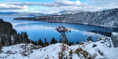 a view of a lake with snow on the ground at Dancing Bear Cabin - Pet Friendly Sleeps 4 Totally cute in South Lake Tahoe