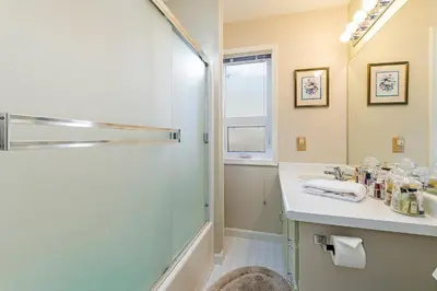 a bathroom with a shower and a sink at Elk Forest Escape - Economy Family Abode in South Lake Tahoe