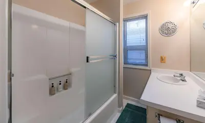 a bathroom with a shower and a sink at Elk Forest Escape - Economy Family Abode in South Lake Tahoe