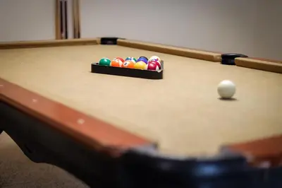 a pool table with balls in a box on it at Paloma Place Lakeview Home Hot Tub Game Room in South Lake Tahoe