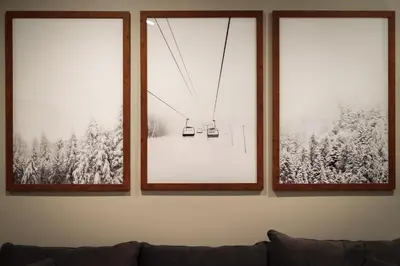 a living room with three windows and a ski lift at It's a Sierra State of Mind - Family Fun in South Lake Tahoe