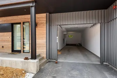 a hallway of a building with a garage at Enjoy Paradise Hot Tub Bike & Beach Equipment in Olympic Valley