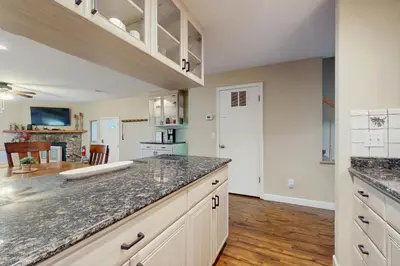 a kitchen with white cabinets and a counter top at The Tahoe Nest in Incline Village