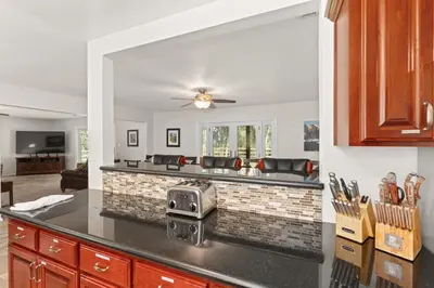 a kitchen with a counter top with a stove at Rivertop Hideaway in Ahwahnee