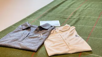 a pair of shorts and a shirt on a table at Ski Way by AvantStay Cozy Tahoe Home w Fireplace Balcony in Incline Village