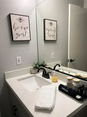 a bathroom with a sink and a mirror at Family Friendly 1st Apple Hill exit Tahoe in Placerville