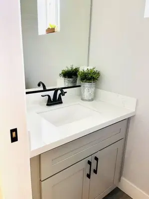 a bathroom with a white sink and a mirror at Enjoy the outdoors 1st Apple hill exit Tahoe in Placerville