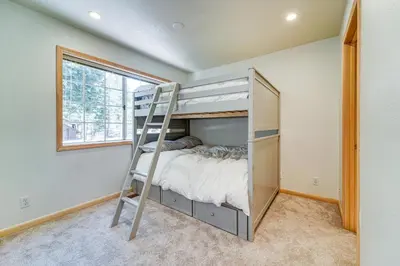 a bunk bed in a room with a ladder at Truckee Retreat half Mi to Tahoe Donner Skiing in Truckee