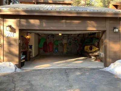 a garage with a bunch of skateboards in it at Serene Vistas at Northstar in Truckee