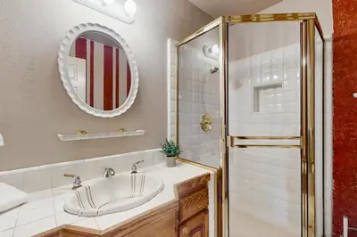 a bathroom with a sink and a shower at Deer Paradise in Coarsegold