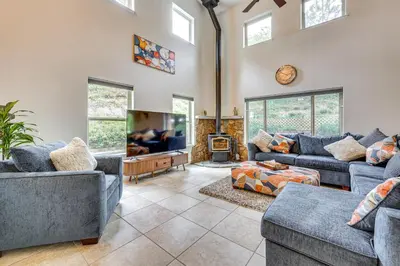 a living room with two couches and a tv at Hot Tub, Games and Sports Luxury Yosemite Escape in Oakhurst