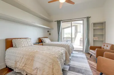 a bedroom with two beds and a couch at On-Site Vineyard Gem on 10 Acres in Pilot Hill! in Pilot Hill