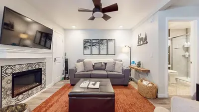 a living room with a couch and a fireplace at Hidden Valley #41 condo in Mammoth Lakes