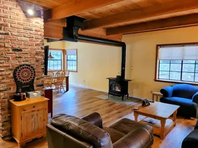 a living room with a couch and a fireplace at Relax Inn - Close to Attractions Galore in Truckee