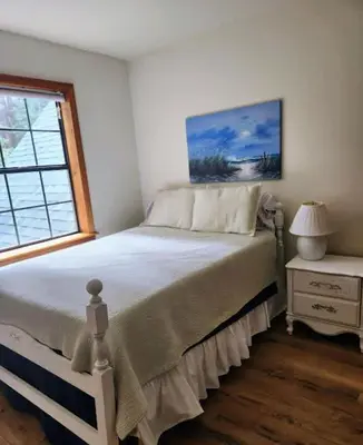 a bedroom with a large bed and a window at Relax Inn - Close to Attractions Galore in Truckee