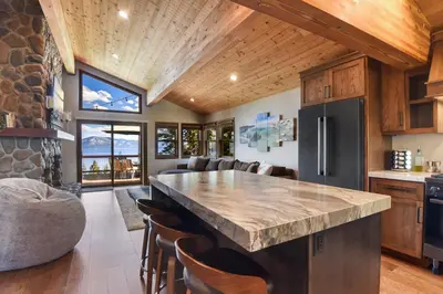 a kitchen with a large marble counter top in a room at Shoreline Vista - Lake Views Near Hike & Bike in Carnelian Bay