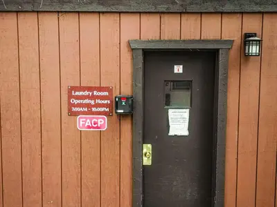 a building with a door and a sign on it at Sierra Pines Retreat - Sleeps 6 in Incline Village