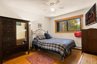a bedroom with a bed and a ceiling fan at Sierra Pines Retreat - Sleeps 6 in Incline Village