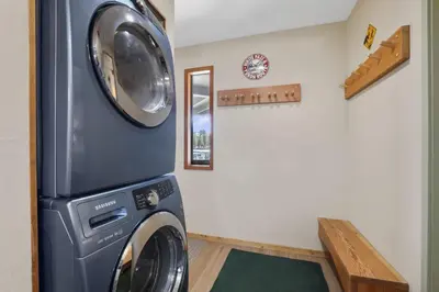 a laundry room with a washer and dryer at Tahoe Keys Marina View - 3 BDR Desirable Community in South Lake Tahoe