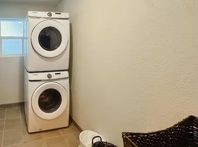 a washing machine and a washer in a room at Tahoe Trail Retreat - Steps from the TRT in Zephyr Cove