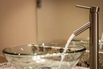 a glass bowl with water pouring from a faucet at Tahoe Woods Villa - Walk to Beach and Gondola - Heavenly Ski in South Lake Tahoe