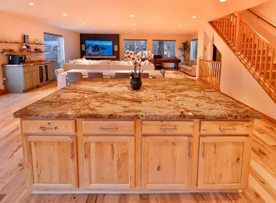a kitchen with a large island in a house at The Elevator House - Sleeps 10 in Stateline