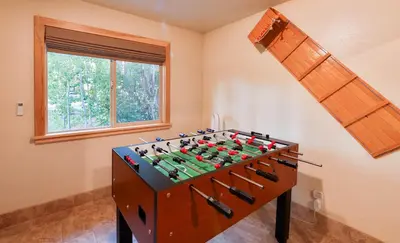 a chess board in the corner of a room at The Meadows - Ski Lease - Extended 30 Plus Days in South Lake Tahoe