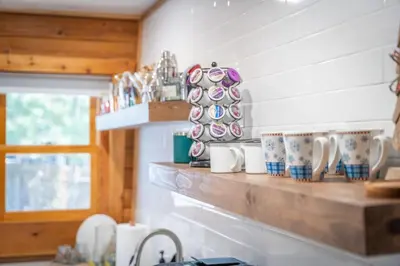 a kitchen with a counter with cups on it at Canoe Cabin I Sleeps 8 I Hot Tub I Pet Friendly in Incline Village