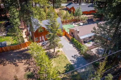 an overhead view of a house and a yard with a pool at Canoe Cabin I Sleeps 8 I Hot Tub I Pet Friendly in Incline Village