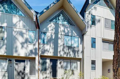 an exterior view of a building with windows at Family Friendly! Incline Village Condo with Foosball in Tyrolian Village