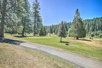 a dirt road leading into a field with trees at Beautiful Large close to Skiing / Wine Tasting! in Pioneer