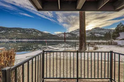 a balcony with a view of a lake and mountains at 136 Bldg C condo in Truckee