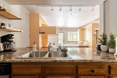 a kitchen with a sink and a counter top at Modern Kirkwood One Bedroom with Deck in Kirkwood