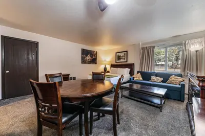 a living room with a table and a couch at 113 Bldg B studio in Truckee