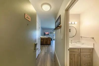 a bathroom with a sink and a mirror at 244 Bldg C condo in Truckee