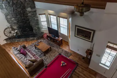 an overhead view of a living room with a pool table at Inside Yosemite Mountain Beauty in Yosemite West