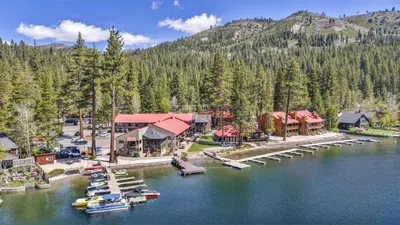 an aerial view of a resort with boats in the water at 111 Bldg B condo in Truckee