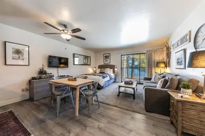 a living room with a bed and a couch at 245 Bldg C condo in Truckee
