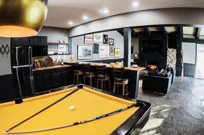 a pool table in a room with a bar at Chamonix #093 - Near Skiing Hiking & More in Mammoth Lakes