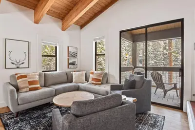 a living room with a couch and a table at Northstar 2BR Walk to Village Bike Hike Rec Center in Truckee