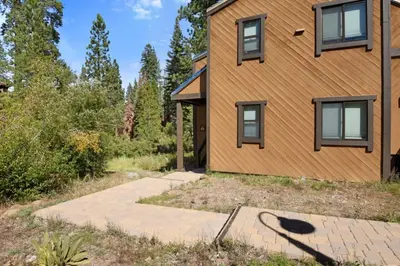a house with a walkway in front of it at Northstar 2BR Walk to Village Bike Hike Rec Center in Truckee