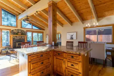 a large kitchen with a large island in a house at Kings Beach Family Retreat - Lake Views and Hot Tub in Kings Beach