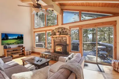 a living room with a couch and a fireplace at Kings Beach Family Retreat - Lake Views and Hot Tub in Kings Beach