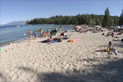 a group of people laying on a beach at Idyllic Incline Village close to Lake Tahoe in Incline Village
