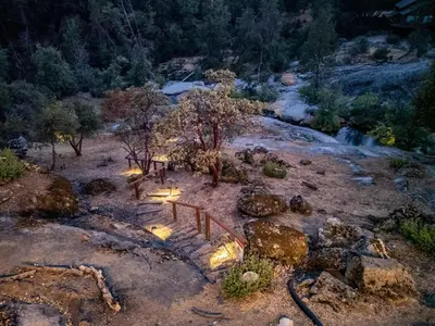 an overhead view of a mountain with a river and trees at Riverfront Serenity with Stunning Views in Mariposa
