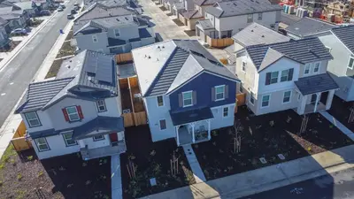 an overhead view of a row of houses on a street at Spacious 4BR-3BA Cozy and Modern in Elk Grove in Elk Grove