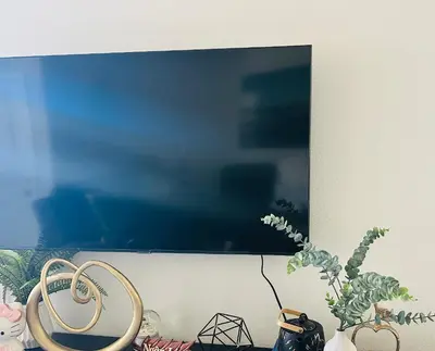 a picture hanging on a wall with two rings at Spacious 4BR-3BA Cozy and Modern in Elk Grove in Elk Grove