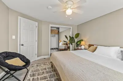 a bedroom with a bed and a ceiling fan at MtnCity Views 4BR Firepit FamilyRetreat NearUNR in Reno