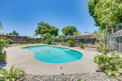 an image of a swimming pool in a yard at Shop, Hike and Explore Fresno Home with Private Pool! in Fresno